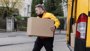 DHL fordert Zweimann-Zustellung für Pakete über 23 kg